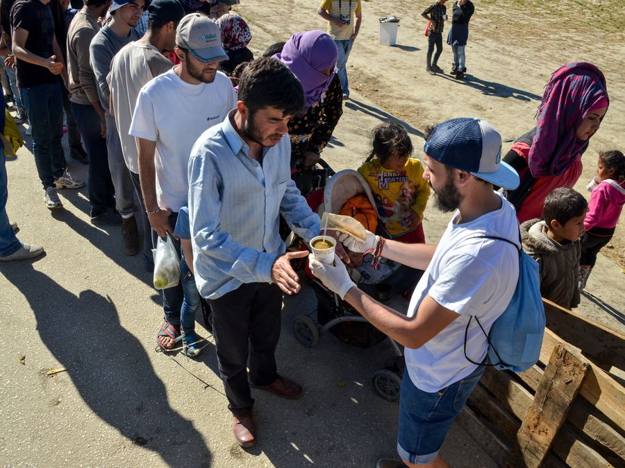 Families waiting in line for aid in Afghanistan