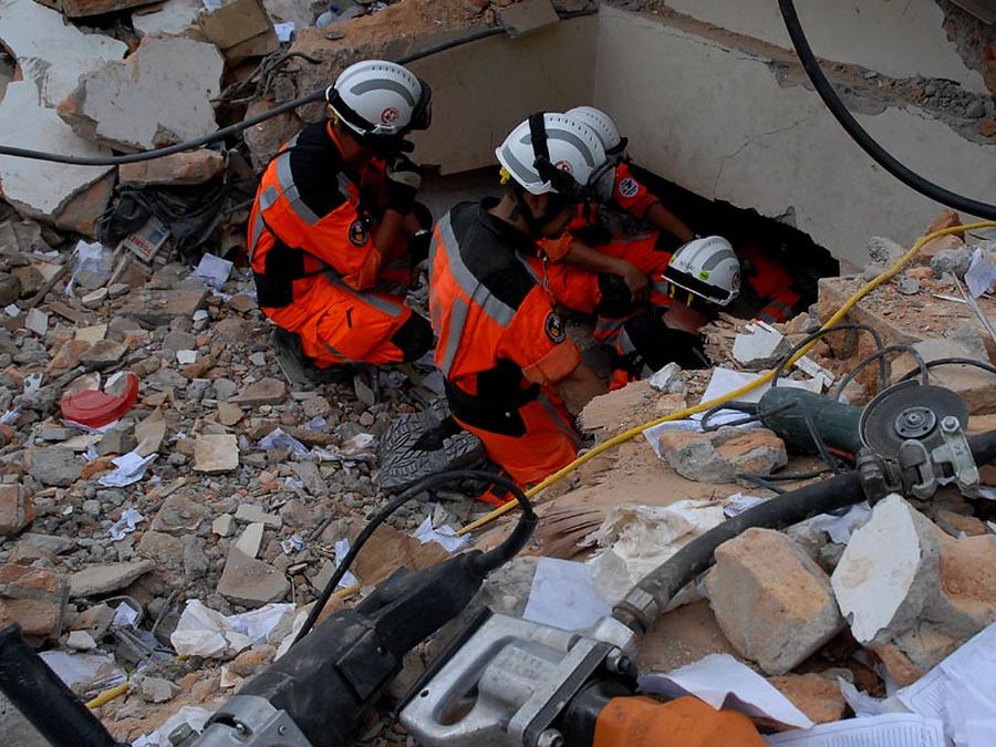 Search and rescue team working inside the rubble