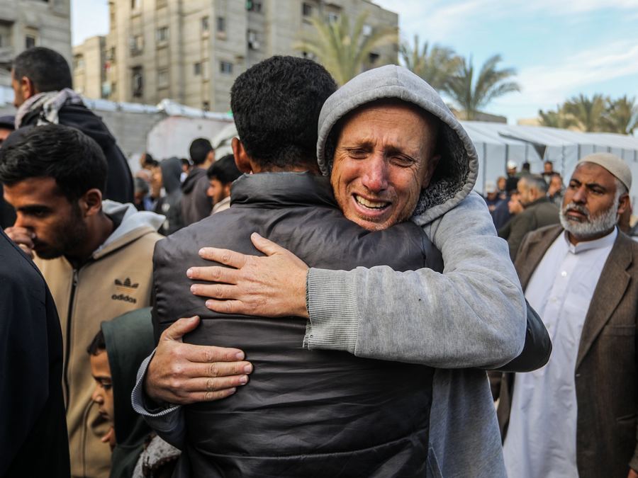 People embracing each other after the disaster